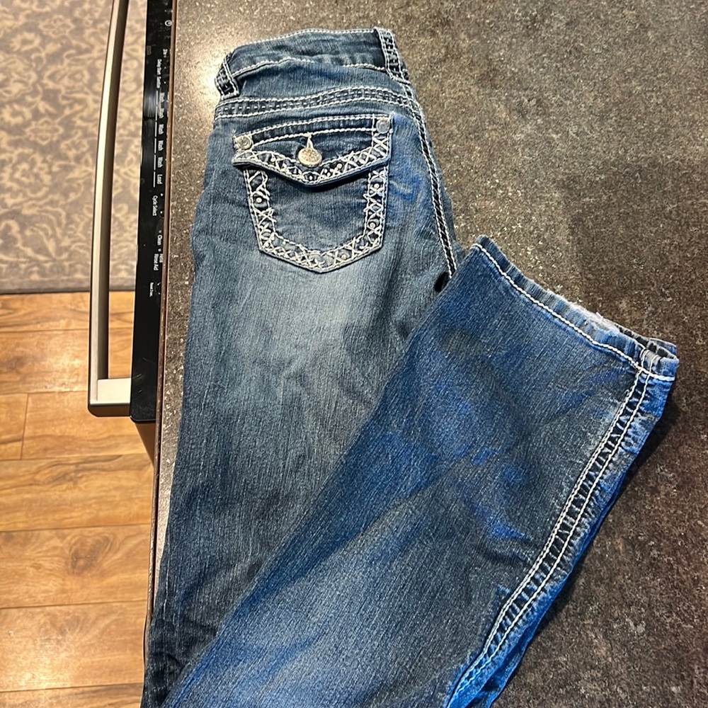 Wearhouse one size 24 jeans. In play condition due to wear, see photos.
